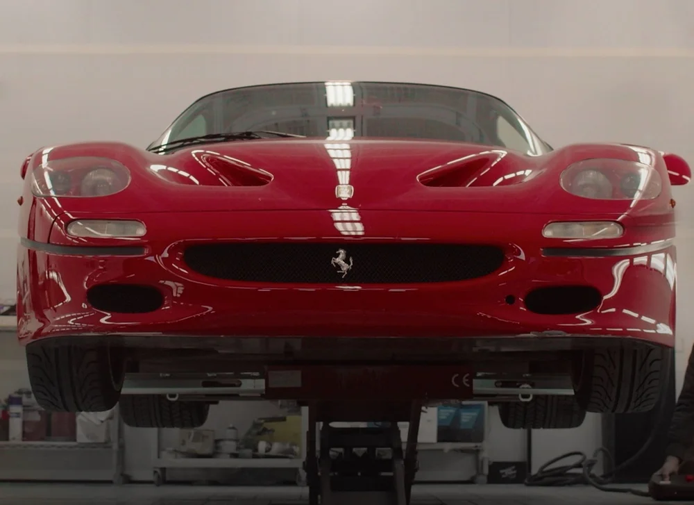 Craftsman restoring a Ferrari F50 interior