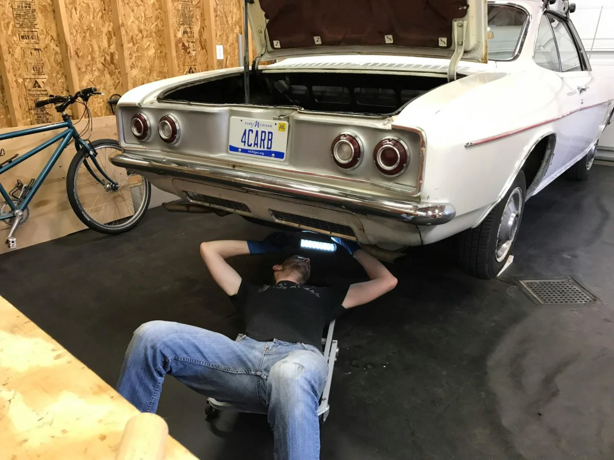 Kyle inspecting under Corvair