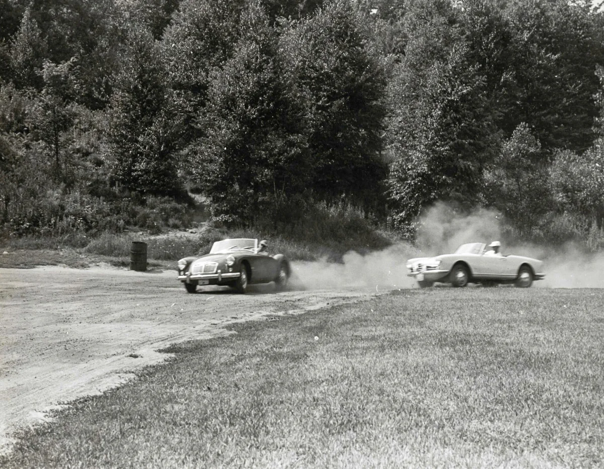 Engineers test MGA and an Alfa Romeo Giulietta